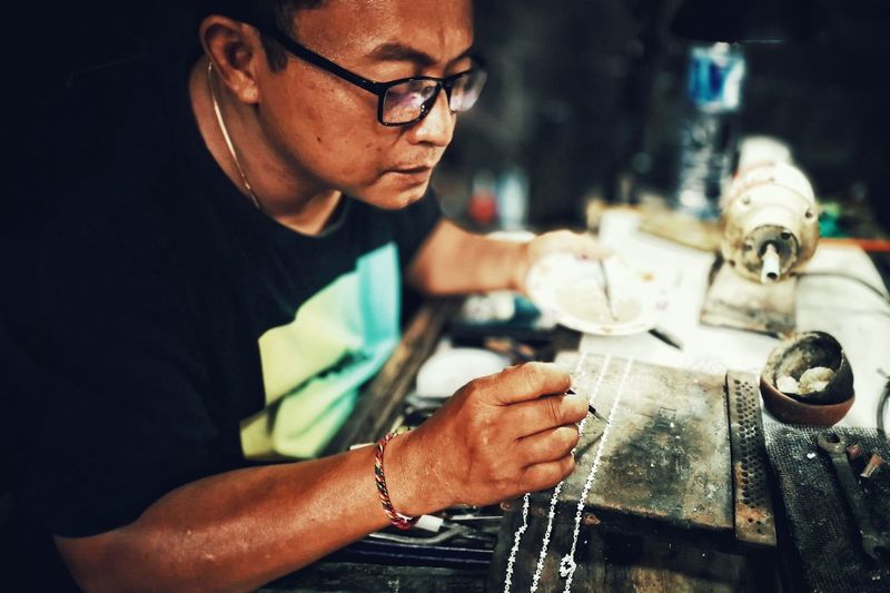 Craftsperson working at workshop