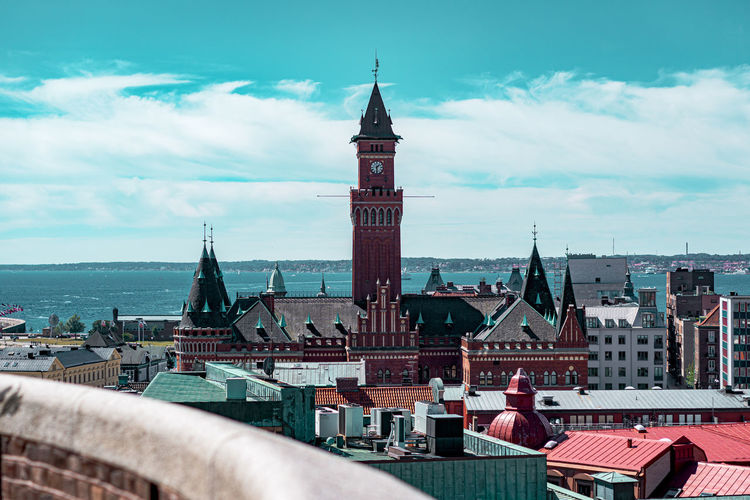 Buildings in city against sky