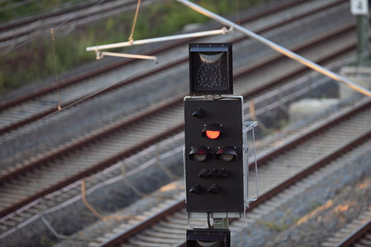 Information sign on railroad tracks