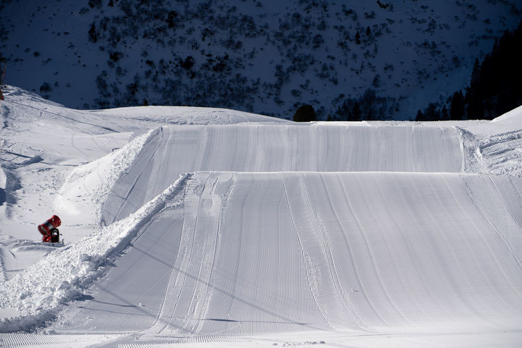 Person skiing on snowcapped mountain