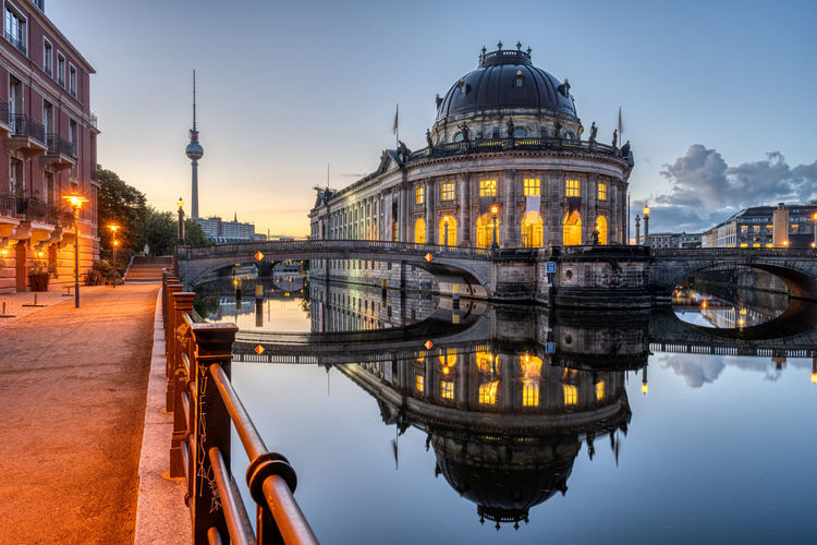 The river spree in berlin before sunrise with the bode-museum and the television tower