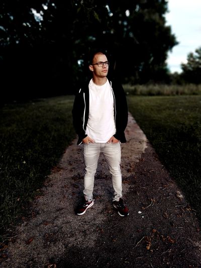 Full length of man standing on field