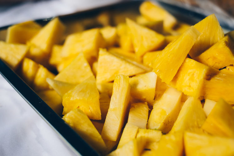 Slices of sweet and juicy mg3 pineapple on stainless steel food platter