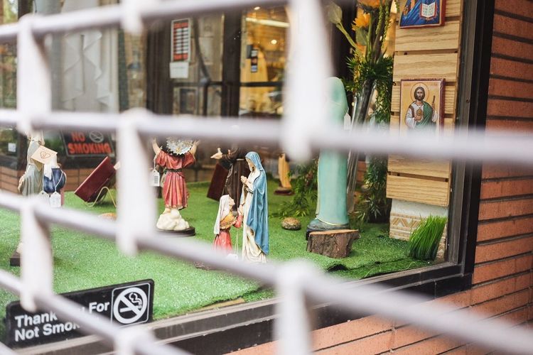 Virgin mary arranged for display at store window