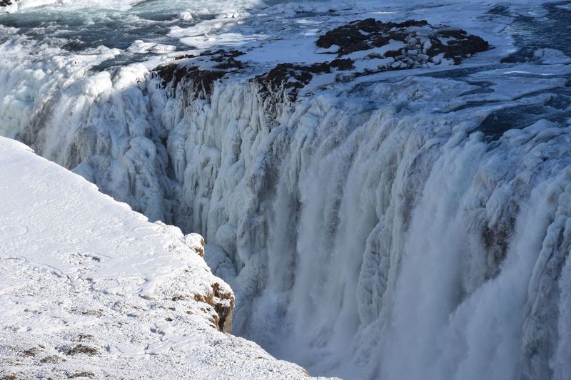 Scenic view of frozen waterfall