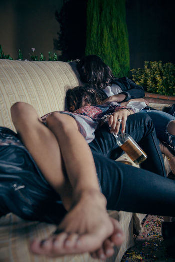 Drunk friends during party in backyard at night