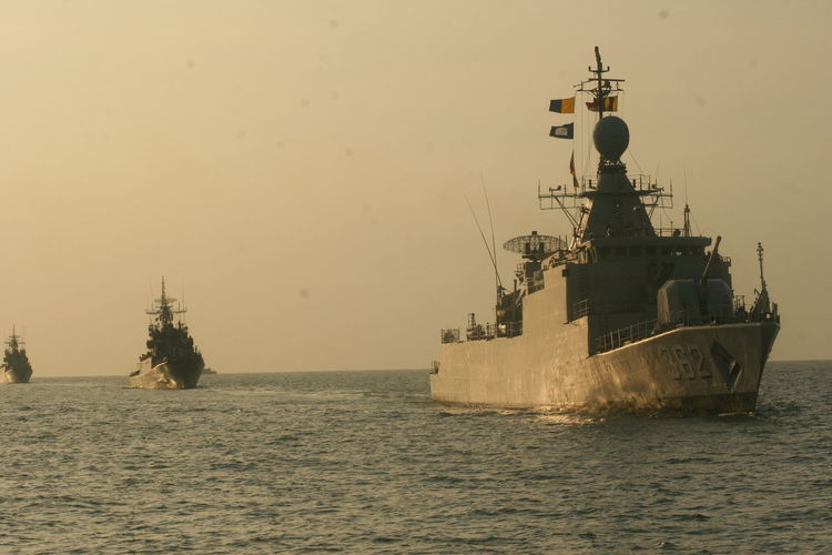 Navy boats in calm sea