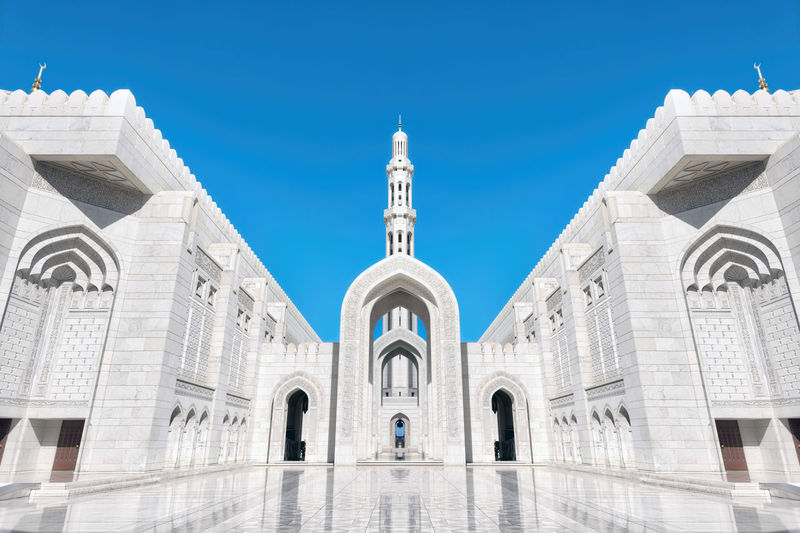 Low angle view of building against blue sky