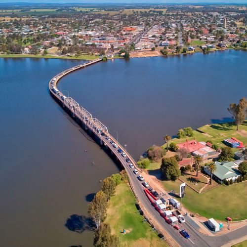 Traffic waiting on the bridge at the border crossing between victoria and new south wales