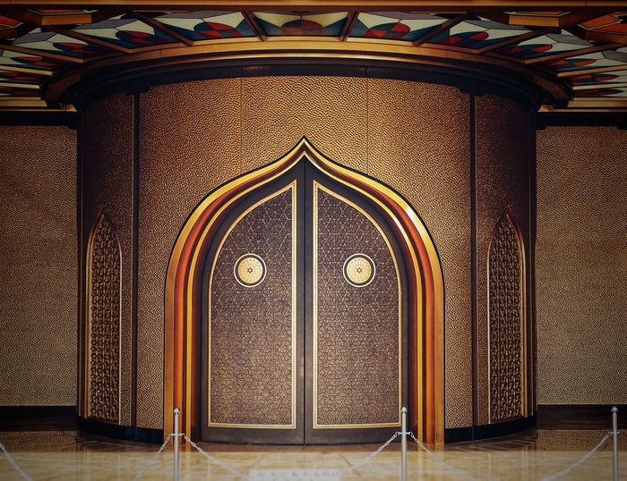 Close-up of ornate door in building