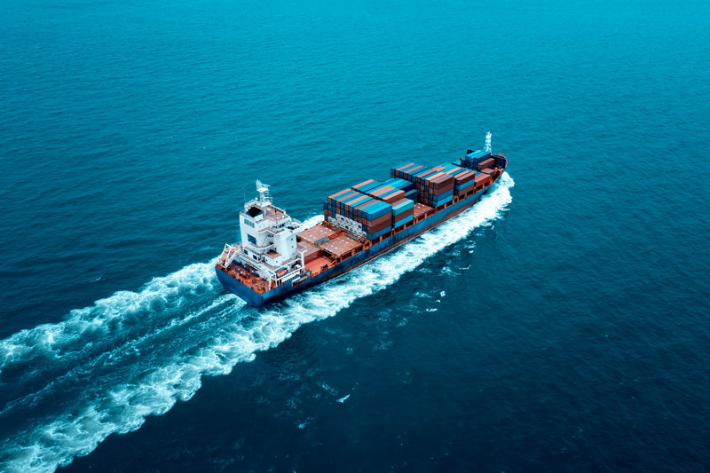 Container ship to import export marine goods to dealers and consumers across the pacific sea