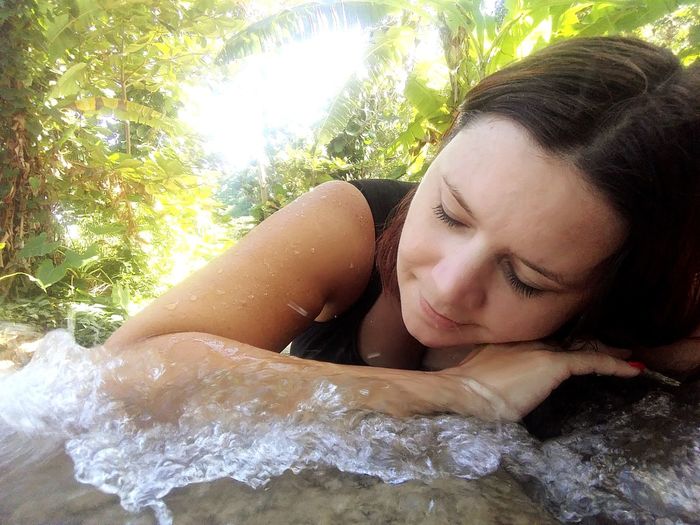 Portrait of young woman lying down