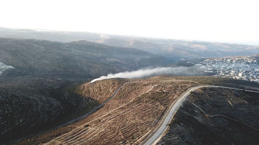High angle view of road amidst landscape against sky