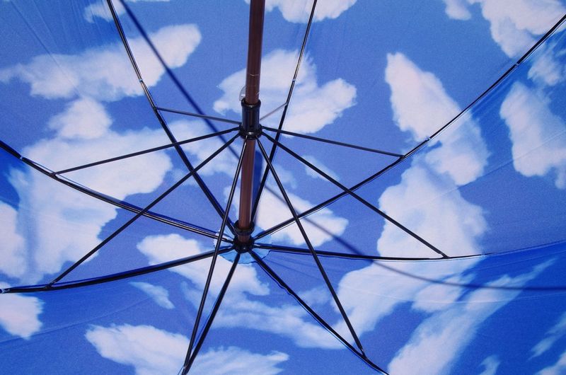 Close-up of sky and clouds printed on umbrella