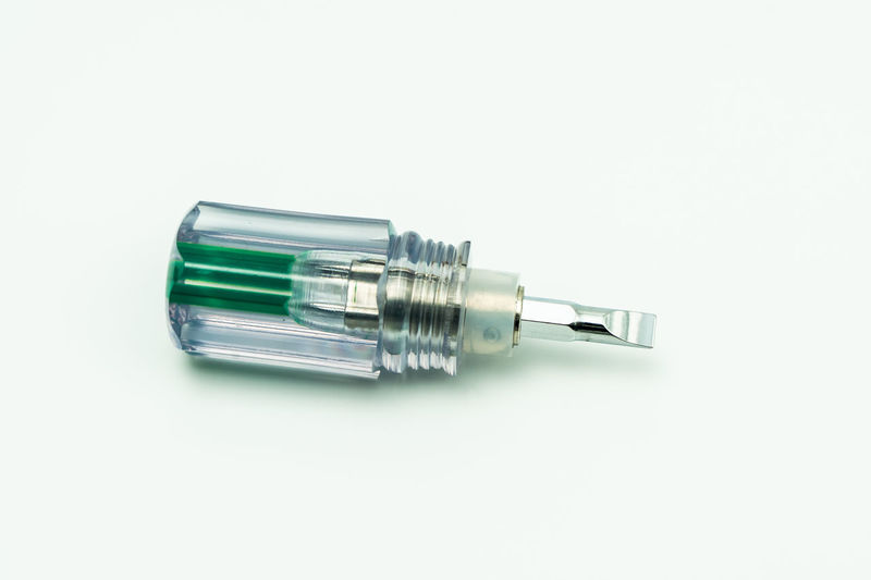 High angle view of screwdriver on white background