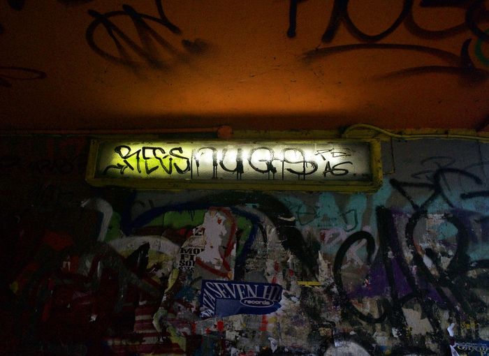 Graffiti on wall at night