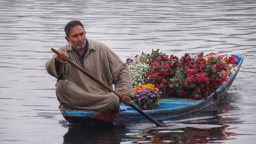 Man rowing boat in lake