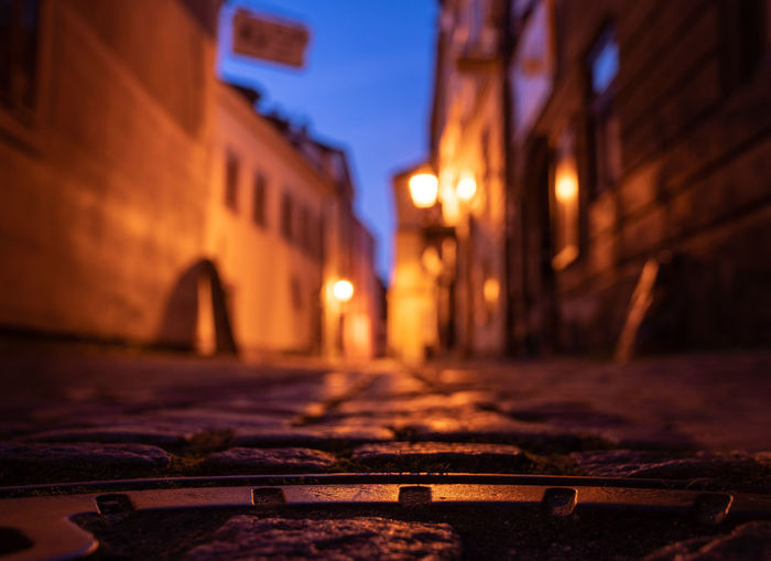 Illuminated street at night