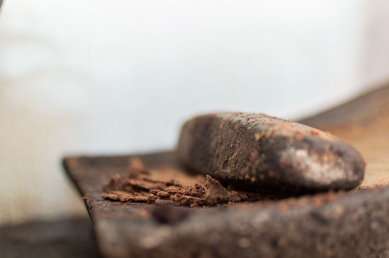 Close-up of crushed cocoa in mortar