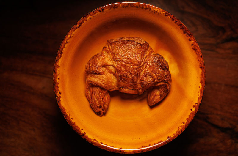 High angle view of french croissant on table
