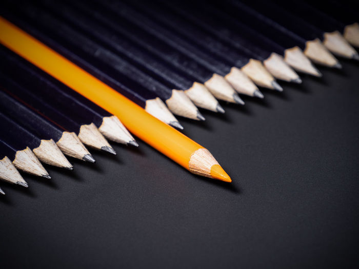 High angle view of pencils on black background