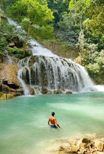 A man see waterfall at sumba island east nusa indonesia
