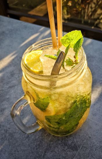 Close-up of drink in glass jar on table