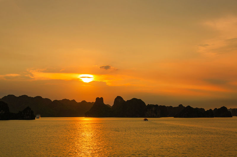 Sunset at ha long bay - vietnam