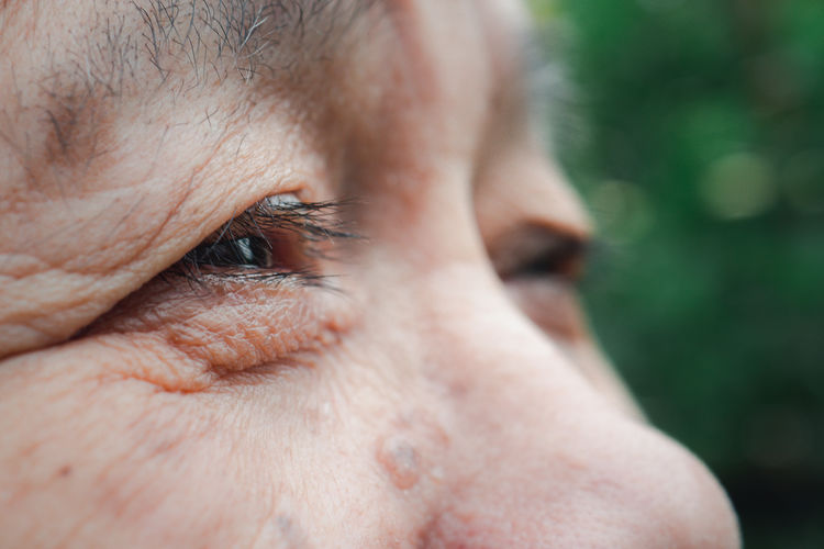 Close-up photo of a senior woman eyes. selective focus. concept of old people and body part