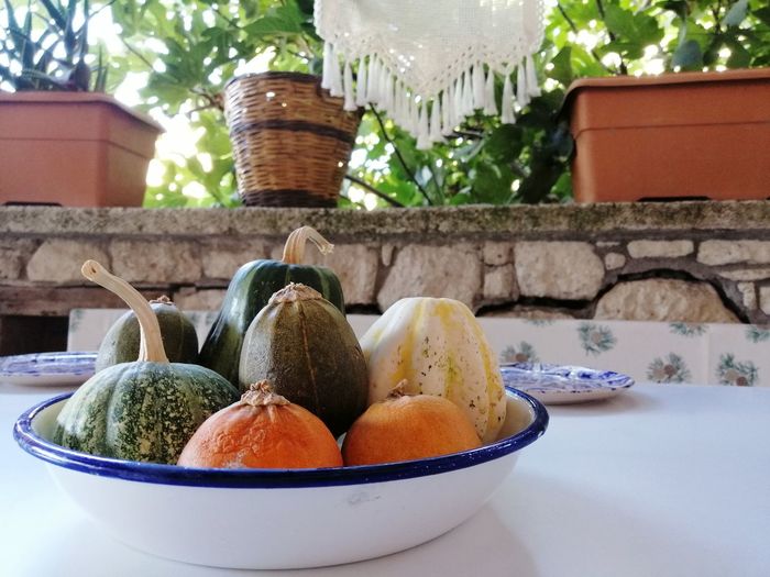 Close-up of fruits in bowl on table