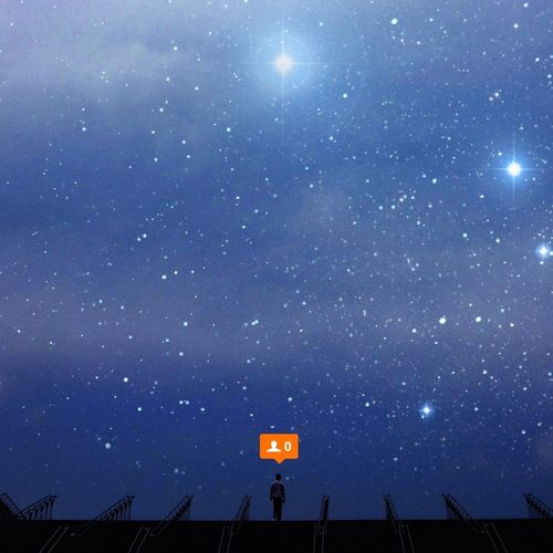 Low angle view of moon against star field