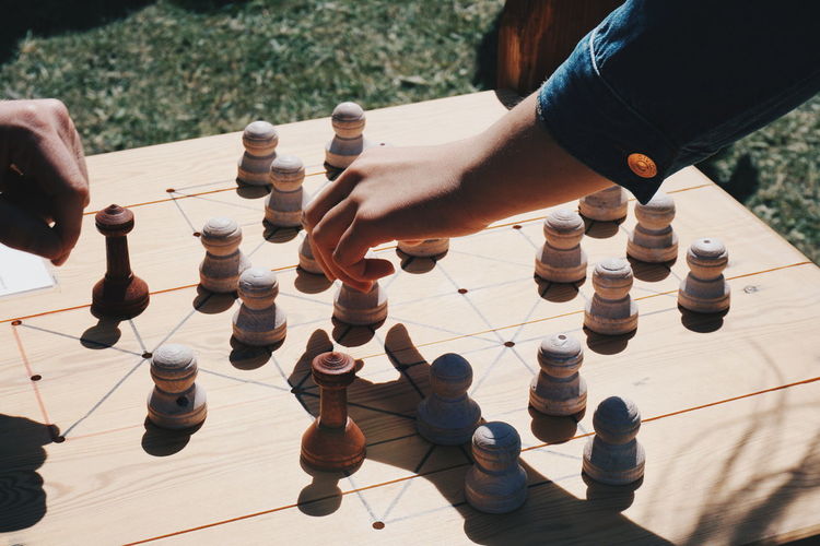 High angle view of chess playing on landscape