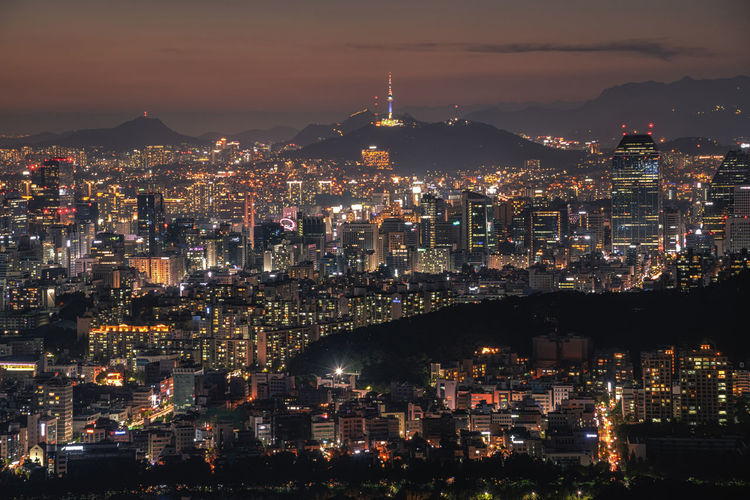 Illuminated cityscape at night