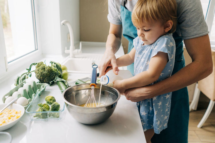 High angle view of boy preparing food at home