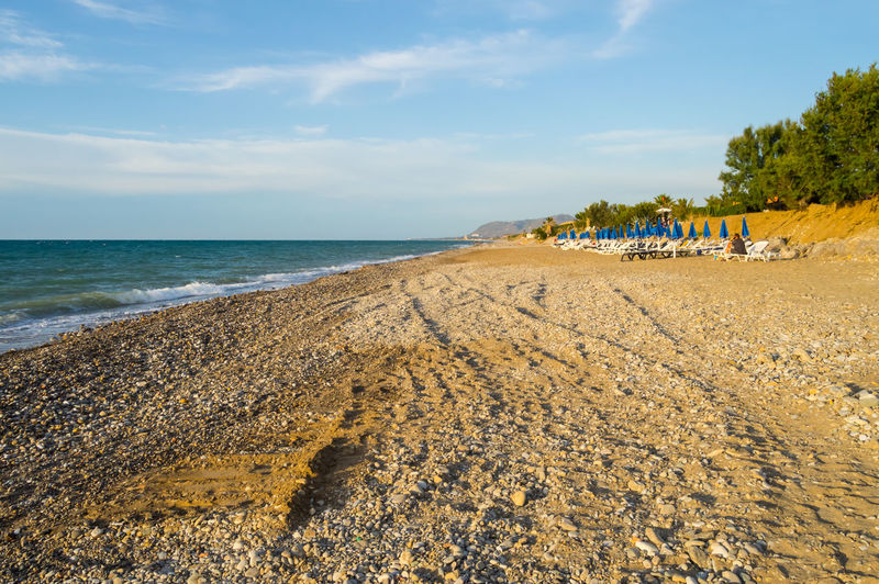 Scenic view of beach against sky