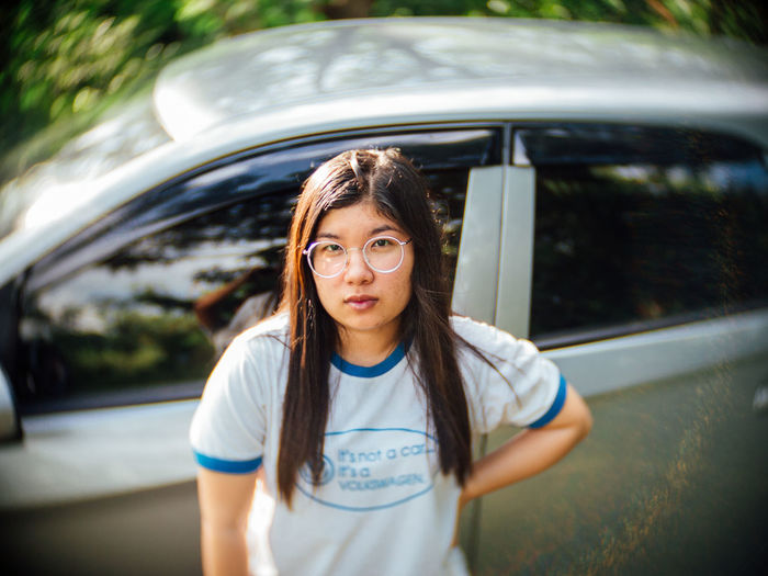 Portrait of a teenage girl in car