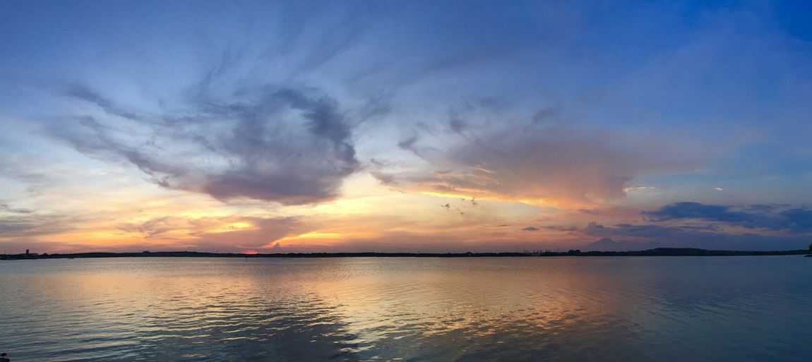 Scenic view of sea at sunset