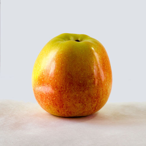 Close-up of apple against white background