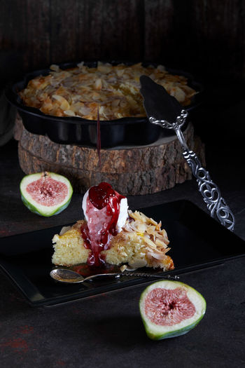 Close-up of dessert with fig on table