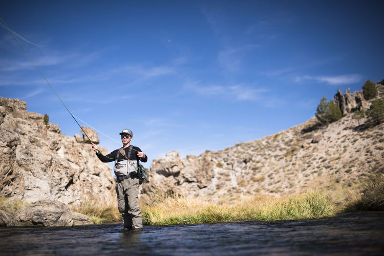 A fly fisherman on the upper owens river.