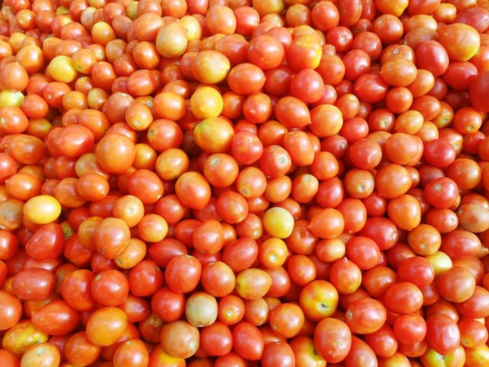 Full frame shot of tomatoes at market stall