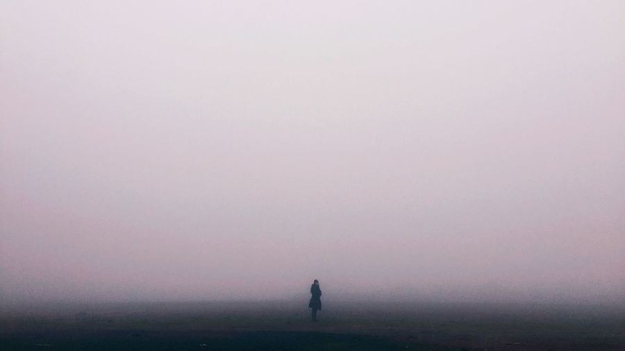 Full length of woman standing in park