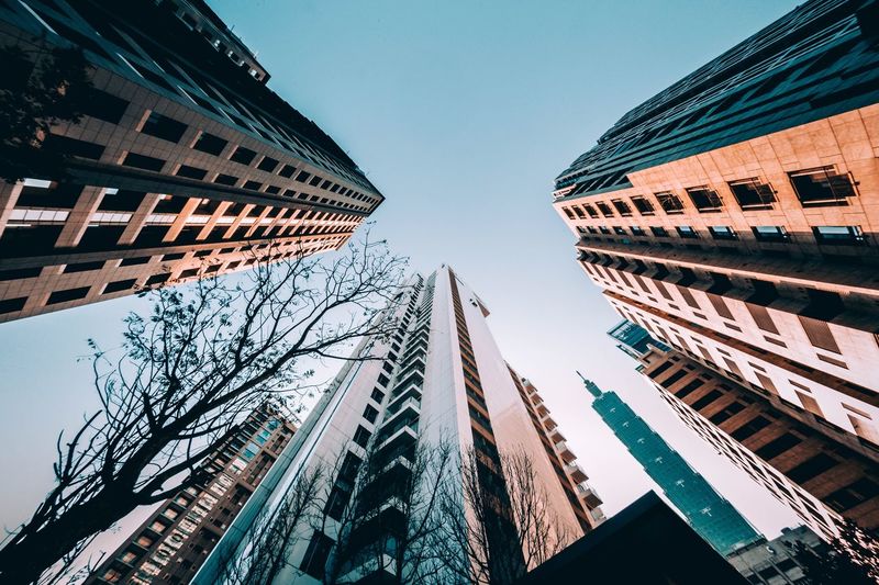 Low angle view of skyscrapers against clear sky