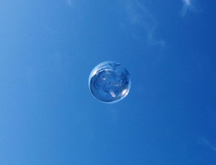 Close-up of water against blue sky