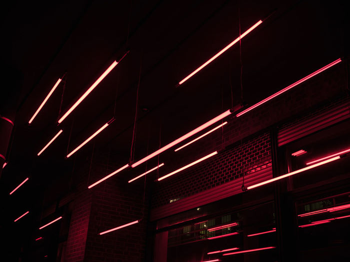 Low angle view of illuminated building at night