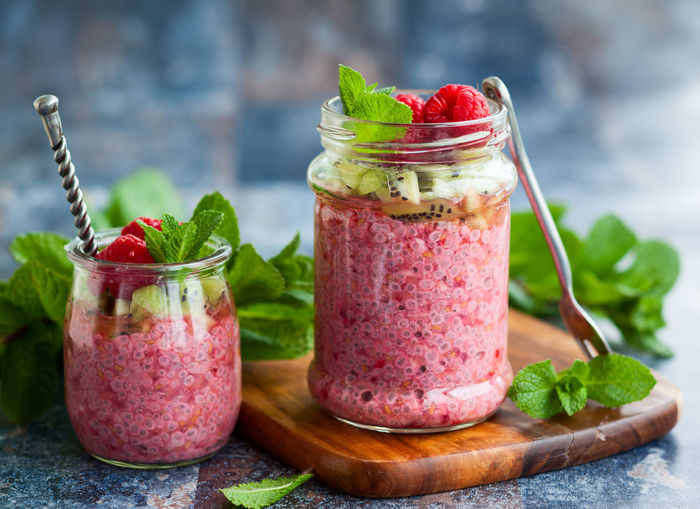 Raspberry,kiwi and chia seeds pudding in jar for breakfast