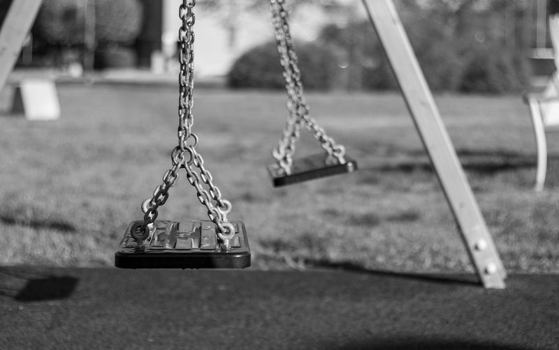 Close-up of swing at playground
