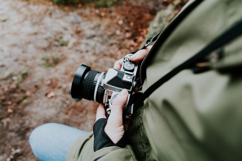Close-up of man with camera
