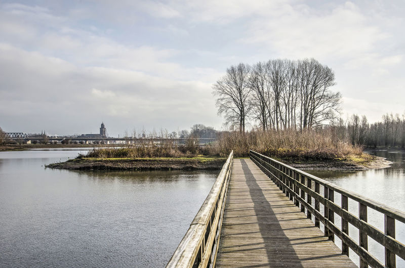 Wooden pedestrian bridge in a nature reserve near deventer, the netherlands