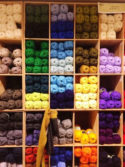 Full frame shot of colorful yarns for sale